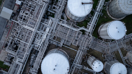 Aerial top view of oil and gas petrochemical storage tank and pipeline steel, Oil and gas...
