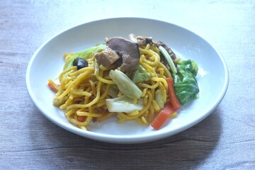 fried yakisoba noodles and cabbage with mushroom vegetarian food on plate