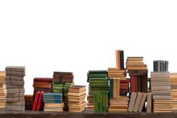 Stacks of many books on a shelf or table on an isolated background. Concept of library, reading, old classic literature