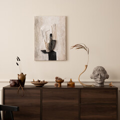 Interior design of living room with mock up poster frame, wooden sideboard, vase with dried...