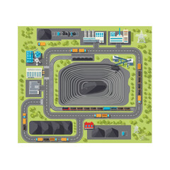 Overhead view of a coal mine with various buildings, roads, and transportation systems.