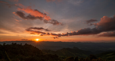silhouettes mountains with orange  sky in sunset time