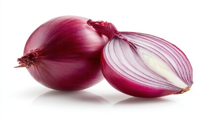 Fresh red onion whole and halved on a white background