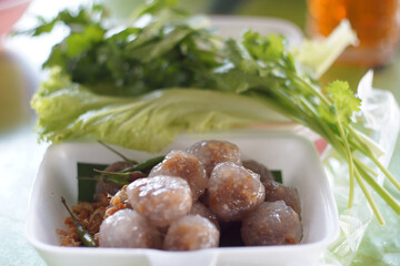 a traditional Thai snack made from chewy tapioca pearls filled with savory minced pork
