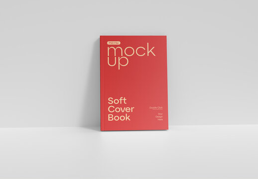 Soft Book Cover Mockup Leaning on Wall