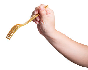 Female hand holding a gold plastic fork isolated on white background.