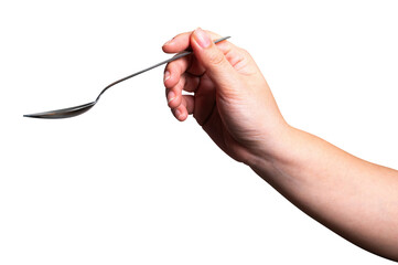 Female hand holding a black plastic spoon isolated on white background.