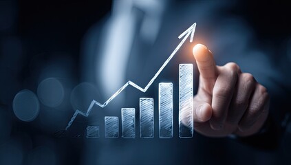Person's hand points to a rising bar graph with an upward arrow