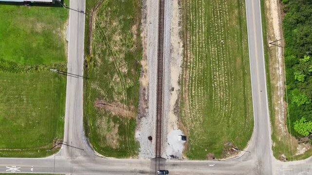 Aerial summer top down of rural Deep South Carriere Pearl River County railway Mississippi MS