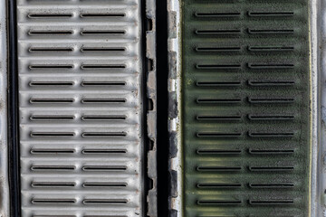 Side by side comparison of clean and dirty radiator core tubes. Automotive cooling system repair and maintenance concept.