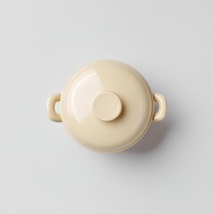 Minimalist Cream Soup Pot with Lid on a Soft Gray Background for Kitchen Decor and Culinary Use