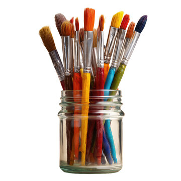 Assorted paintbrushes in a glass jar cut out