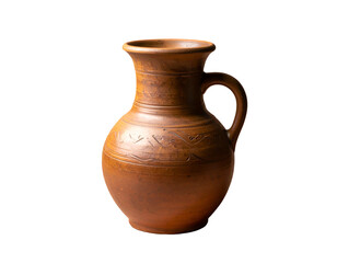 A brown earthenware pitcher with a handle, isolated on a stark black background