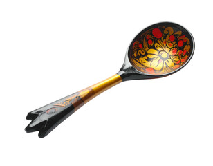 Elaborately painted wooden spoon with floral design on a black background