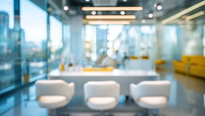 Blurred modern office interior with seating and windows
