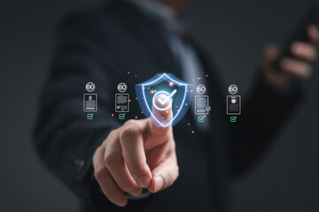 Document security concept showing a businessman touching digital shield with check mark representing data protection privacy certification cyber safety and information management in modern business