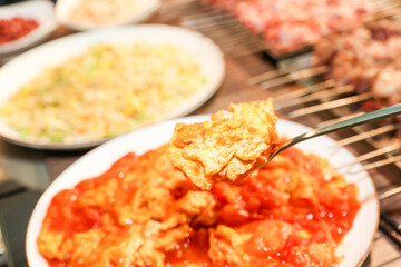 Chinese food. Tomato and egg stir fry