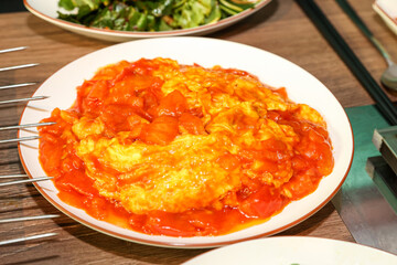 Chinese food. Tomato and egg stir fry