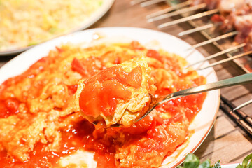 Chinese food. Tomato and egg stir fry