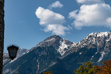 Snow-Capped Alpine Mountains with Blue Sky and Lantern – Scenic Mountain Landscape, Travel and Nature Photography