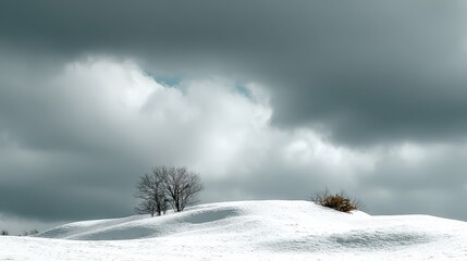 Winter landscape with cloudy sky and snow-covered hills
