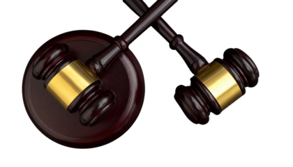 Dual courtroom gavel designs with golden detail isolated on black background