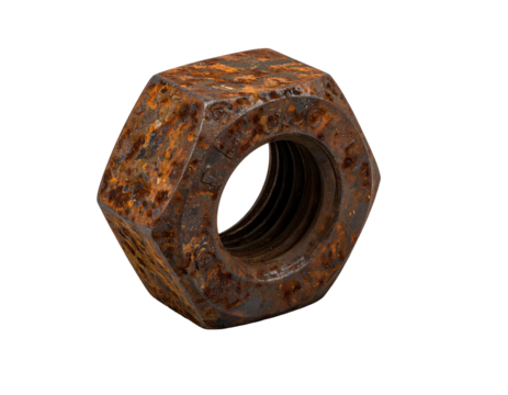 Close-up of a heavily rusted hexagonal metal nut with visible internal threads