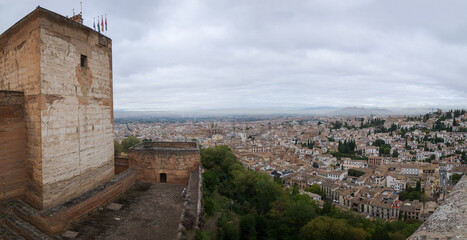 Granada, Spain - 21 Oct 2025: View of Granada cityscape from the Alcazaba, fortress towers and...
