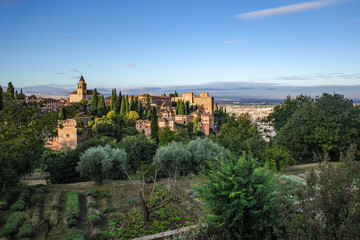 Obraz premium Granada, Spain - 21 Oct 2025: View to Alcazaba from The Palacio de Generalife, La Alhambra, Granada