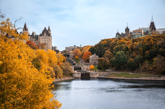 Historic Rideau Canal locks, downtown Ottawa, Ontario, with colorful autumn foliage, Fairmont Chateau Laurier hotel and Parliament Hill create stunning fall cityscape in Canada capital (October 2025)