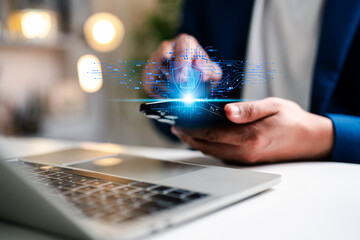 A businessman using mobile phone and laptop, secure access to user personal information, secure Internet access, information security encryption. Cybersecurity internet network data privacy concepts.
