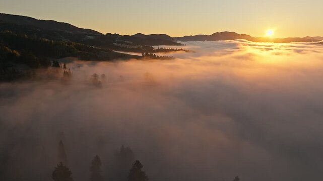 A Breathtaking Sunrise Over a Picturesque Foggy Landscape Scene