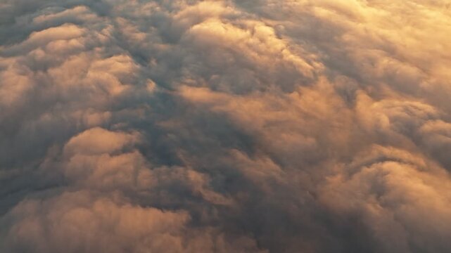 A Serene Aerial Cloudscape Captured at Sunset for All to Admire