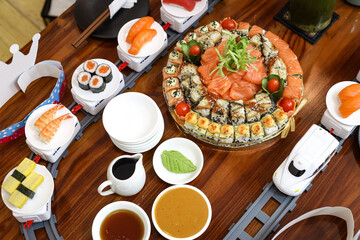 Sushi Feast - A Culinary Delight on a Wooden Table.
