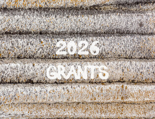 2026 Grants symbol. Concept words 2026 Grants on beautiful grey mountain wall. Beautiful grey mountain wall background. Business and 2026 grants concept. Copy space.