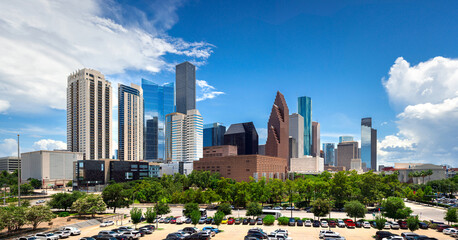 Fototapeta premium Houston Downtown modern business city with skyscraper city scape with park view from Buffalo Bayou center of Houston city, Texas, United States of America, US with sunny day in Texas summer