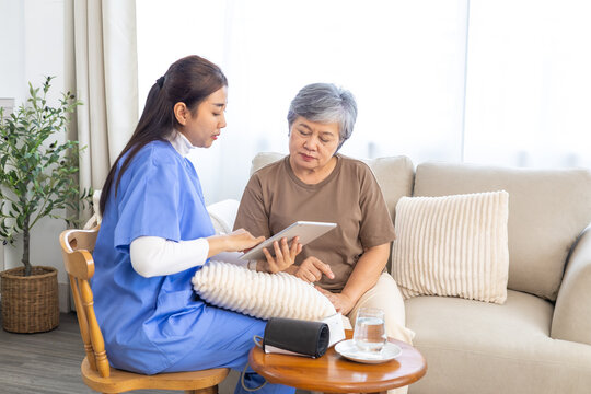 Caregiver nurse checking blood pressure of senior patient at home, measuring pulse and monitoring health in calm environment, professional healthcare, warm, and supportive medical assistance
