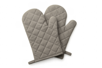 Pair of insulated oven mitts protecting hands while cooking