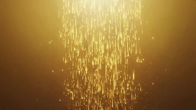 Luxurious abstract animation of shimmering golden particles streaming rapidly downwards like rain or a shower of glitter on a golden ambient background