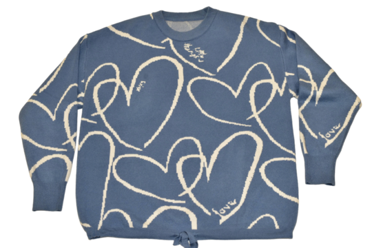 Women's blouse, with white heart silhouette designs on a blue background, photographed against a PNG background.
