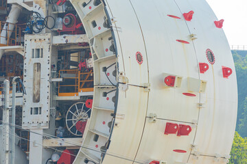 Drill head for railway tunnel boring machine