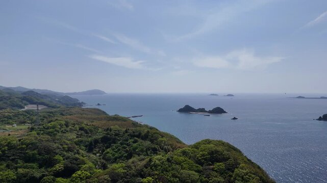長崎県長崎市、五島灘の風景を空撮しました。遠くに軍艦島が見えます。