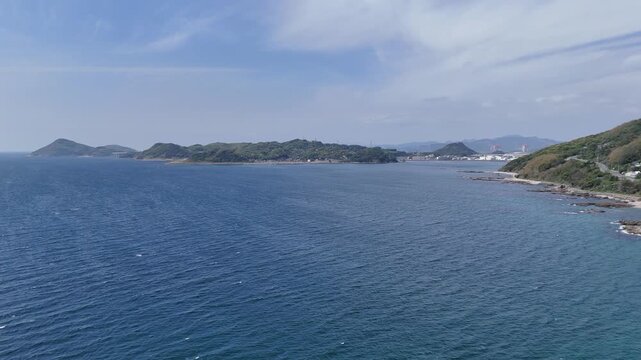 長崎県長崎市、五島灘の風景を空撮しました。遠くに軍艦島が見えます。