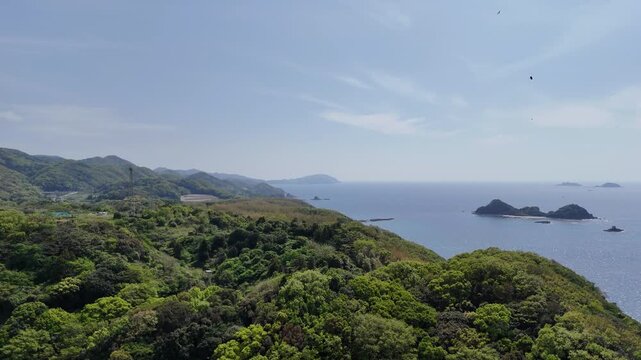 長崎県長崎市、五島灘の風景を空撮しました。遠くに軍艦島が見えます。