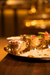 Indian Thali Meal with Chapati and Side Dishes