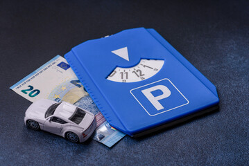 A parking disc, permit, or ticket for measuring time and paying municipal services. A parking disc