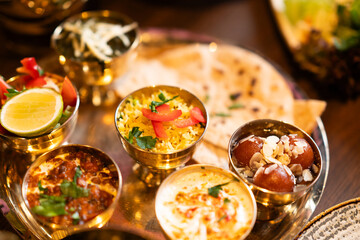 Indian Thali with Curry, Rice, Bread and Sweets
