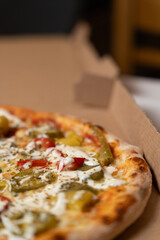 Fresh Pizza with Colorful Peppers in Box