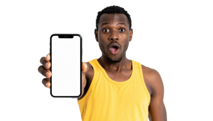 A man with a surprised expression, holding a smartphone with a blank screen