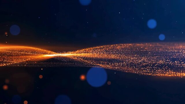 Dynamic abstract animation of shimmering orange/golden particles flowing horizontally in a wave pattern against a dark, cosmic blue background with subtle bokeh